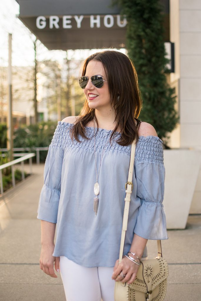 Karen Rock, a Houston based Style blogger wears a blue off the shoulder top with the Kendra Scott Rayne necklace in a spring outfit idea.