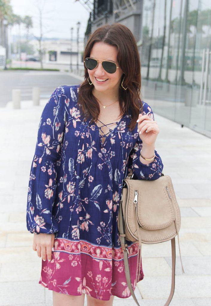 Lady in Violet, a Houston based Fashion Blogger wears boho chic style featuring a cute floral swing dress for a weekend outfit.