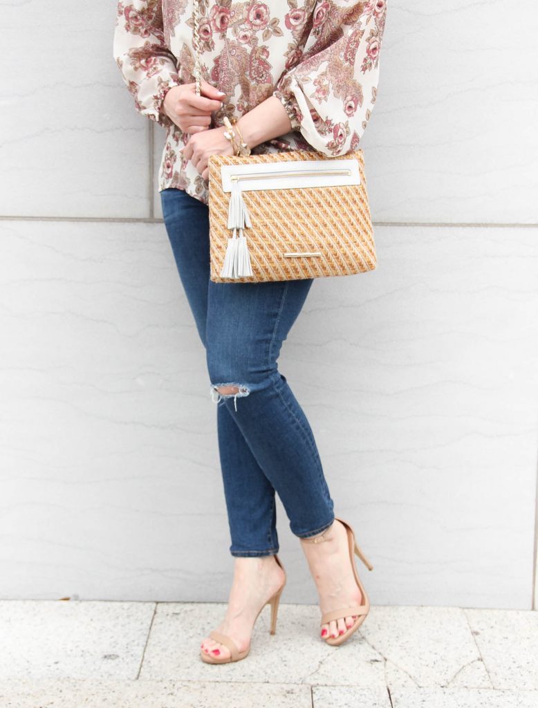 Houston fashion blogger lady in violet wears distressed jeans with heels for spring outfit inspiration.