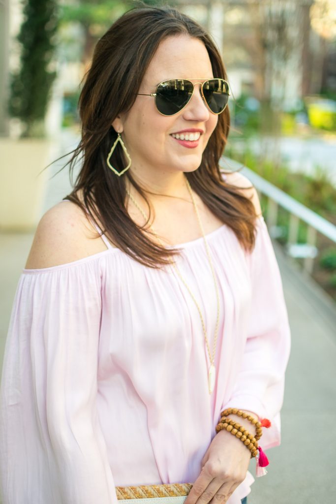 Houston fashion blogger Karen Rock styles a pink cold shoulder top for a weekend outfit.