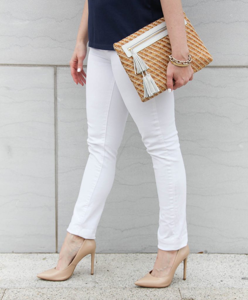 Houston fashion blogger shares a paige white denim review and carries the elaine turner straw tassel clutch.