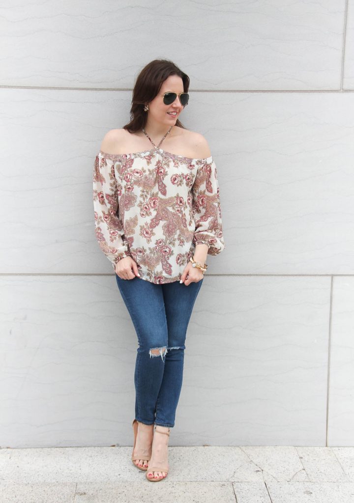 Houston based blogger, Lady in Violet styles a casual weekend outfit including distressed jeans and a floral blouse.