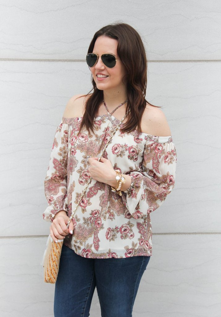 Lady in Violet, a houston based fashion blogger wears a cute floral cold shoulder top for spring.