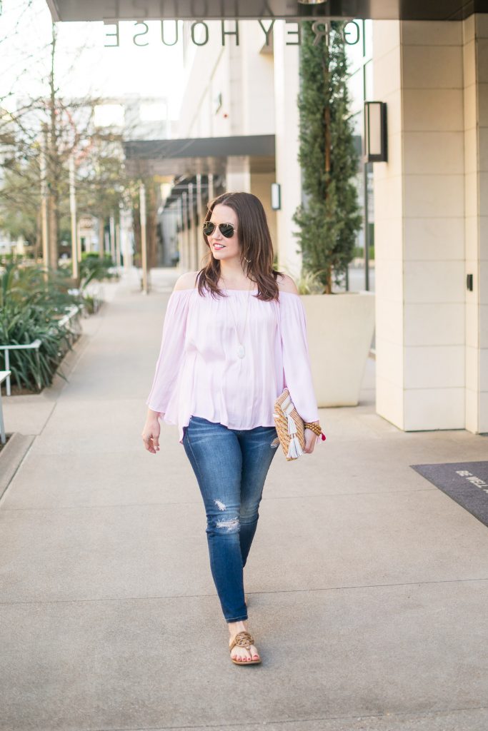 Houston fashion blogger wears a vince camuto cold shoulder top and distressed jeans with the Tory Burch miller sandals for a spring outfit idea.