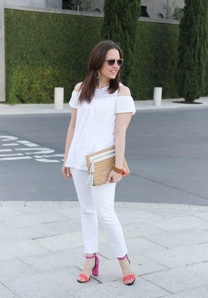 Houston fashion blogger styles a spring outfit idea featuring a white on white outfit with pink block heel sandals.