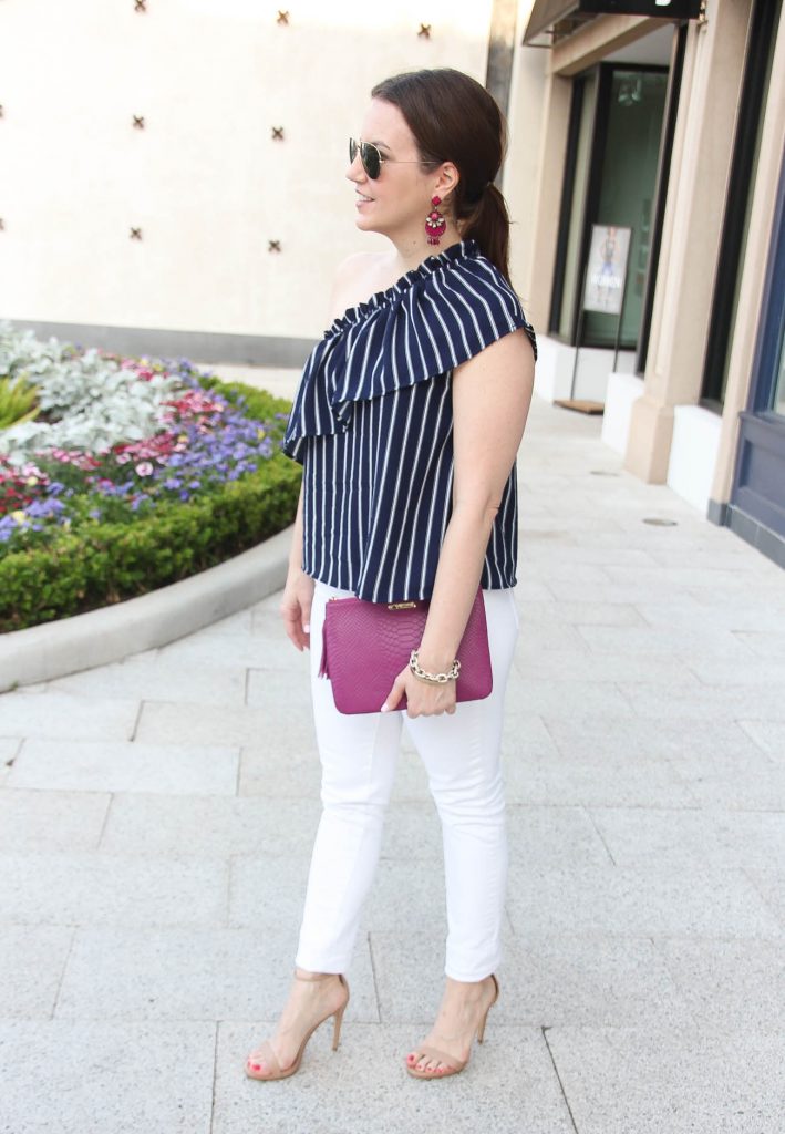 Houston fashion blogger wears a navy and white outfit for summer outdoor party.