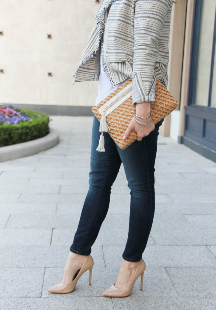 Houston fashion blogger styles a casual chic outfit idea for spring with jeans and a jacket.