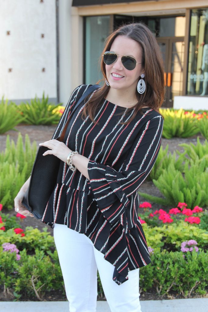 Houston style blogger wears bell sleeve peplum top and shares spring trends.