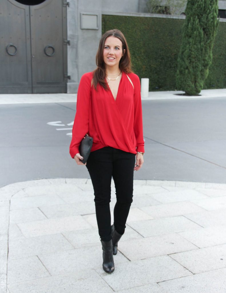 red top and black jeans