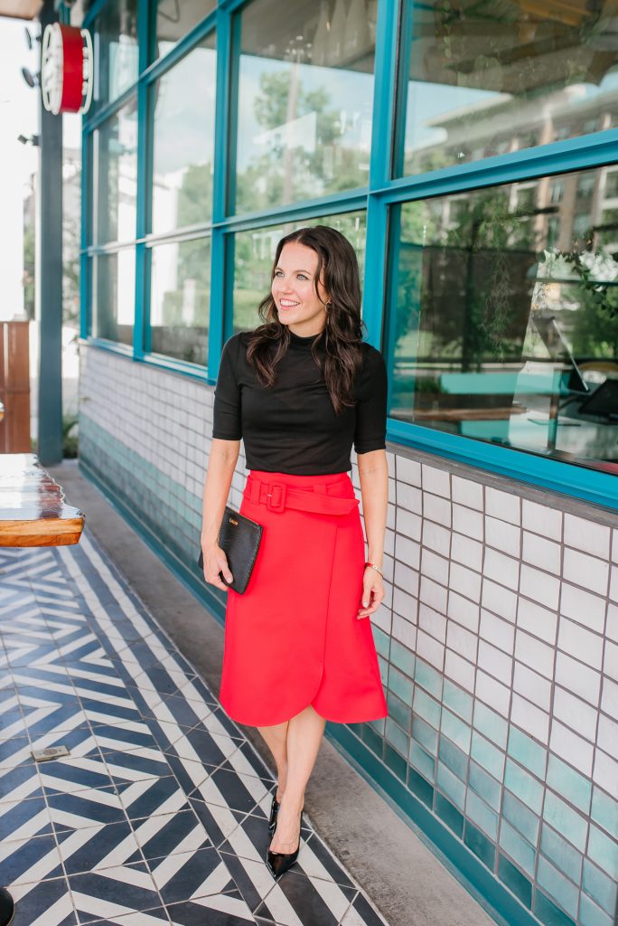 Red skirt best sale black top outfit