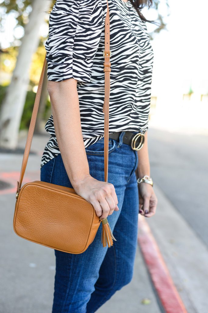 casual outfit | light brown small crossbody handbag | zebra printed tee | Popular Fashion Blog Lady in Violet