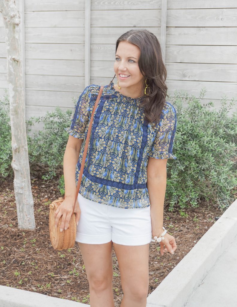 casual spring outfit | yellow blue floral print blouse with a circle straw purse | Houston Fashion Blog Lady in Violet