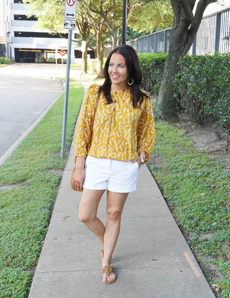 http://ladyinviolet.com/wp-content/uploads/2020/06/a-summer-outfit-yellow-floral-top-white-cotton-shorts-791x1024.jpg