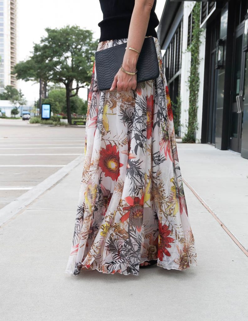 spring wedding guest outfit | floral maxi skirt | black python clutch purse | Petite Fashion Blog Lady in Violet