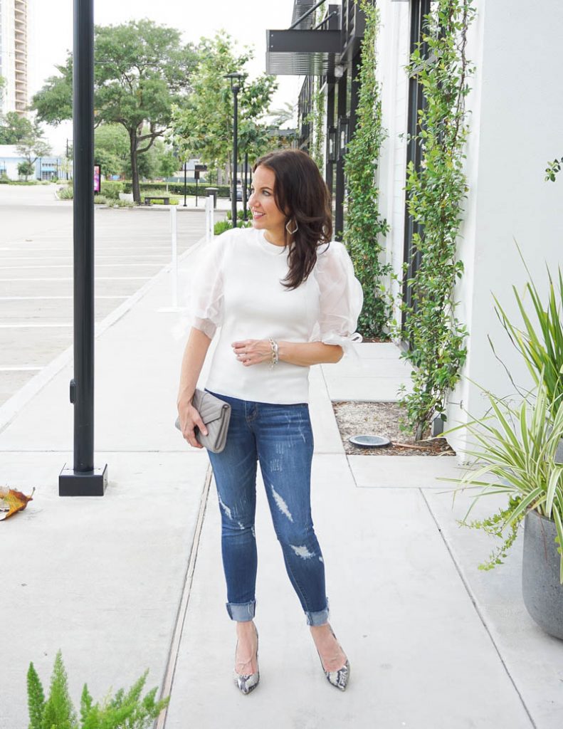 summer outfit | white puff sleeve blouse with distressed denim | Petite Fashion Blog Lady in Violet