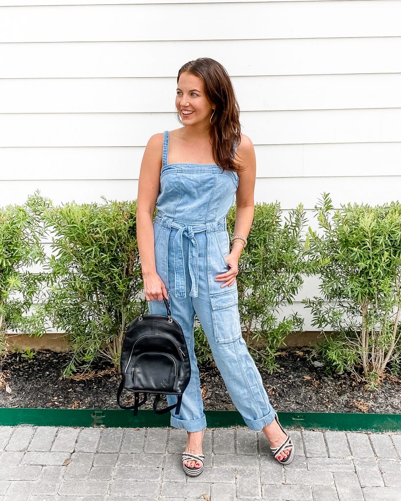 date night outfit | denim jumpsuit | black backpack purse | Petite Fashion Blogger Lady in Violet