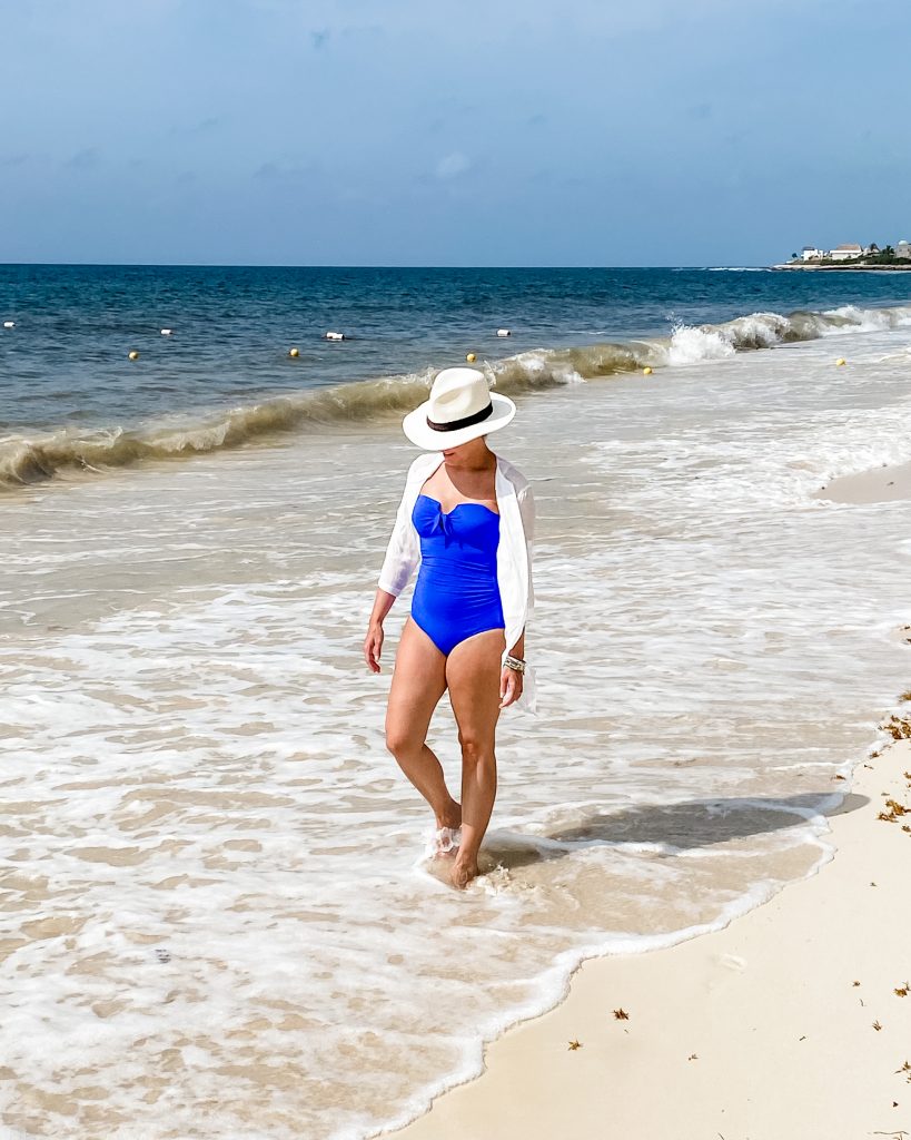 what to pack for an all inclusive resort | blue one piece bathing suit | white shirt coverup | Houston Fashion Blog Lady in Violet