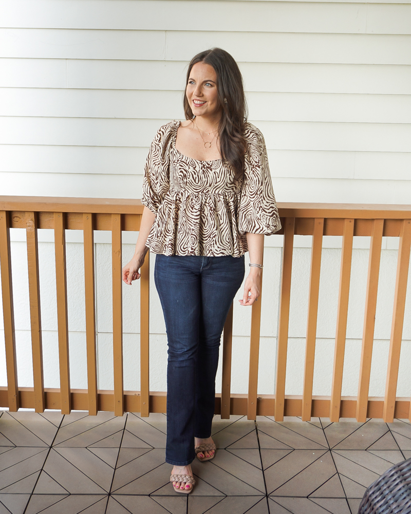 business casual outfit | wild print empire waist blouse | dark wash flared jeans | Petite Fashion Blog Lady in Violet