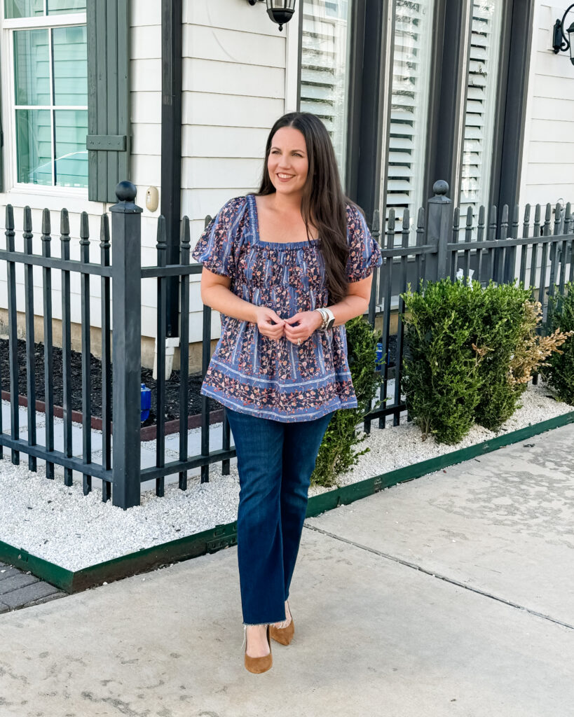 warm fall outfit idea | blue foral top | dark blue flared jeans | Petite Fashion Blog Lady in Violet