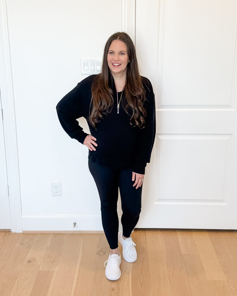 winter outfit | loungewear | black half zip pullover | white slip on sneakers | Mom Fashion Influencer Lady in Violet